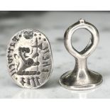 A silver seal, circa 1600, 2.