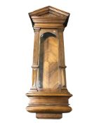 A walnut clock case,