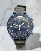A gent's Omega Swatch Speedmaster Mission to Neptune quartz centre seconds chronograph wristwatch,