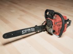 A Power King 52cc petrol chain saw