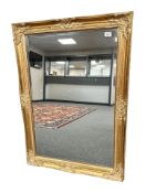Contemporary gilt and bevelled mirror,