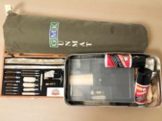 A G M K gun mat together with cleaning kit and other shooting items (1 box)