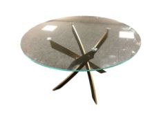 An Italian Bontempi glass topped dining table on metal base,