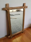 An oak framed wall mirror,