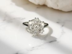 An 18ct white gold diamond cluster ring, approximately 1.