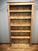 A modern pine open bookcase,