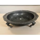 An Arts and Crafts pewter tripod dish,