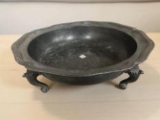 An Arts and Crafts pewter tripod dish,