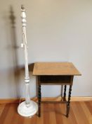 An oak occasional table and a painted standard lamp