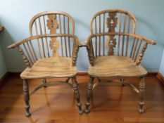 A pair of reproduction yewwood Windsor armchairs (2)