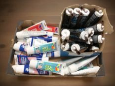 Assorted bottles of wood filler, grout,