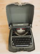 A Bluebird typewriter marked Made in Germany US Zone
