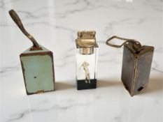 Two 1950's triangular-form compacts,