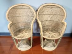 A pair of 20th century wicker peacock armchairs,