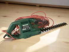 A Qualcast electric hedge trimmer