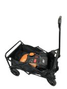 A garden cart and Worx automatic lawn mower