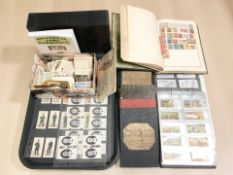 A large quantity of cigarette cards, John Player and Sons, Stamp album,