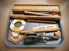 A group of wooden rolling rules, Victorian desk punch, RMS Andes wooden plaque,