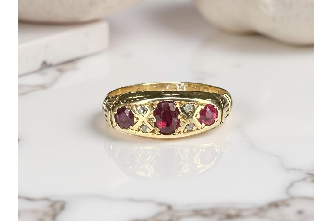 An antique 18ct gold ruby and diamond ring,