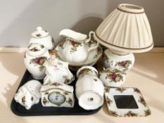 A group of Royal Albert Old Country Roses porcelain to include lamp base, Quartz time piece,