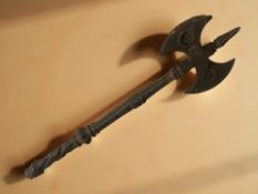 An ornamental cast iron axe,