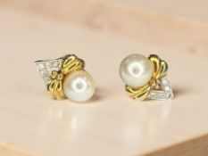 A pair of 18ct yellow gold pearl and diamond earrings