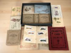 A collection of cigarette cards in albums