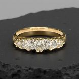 An antique 18ct gold five stone diamond ring, the total diamond weight approximately 0.