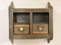 A Victorian oak smoker's wall cabinet fitted with drawers,