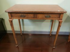 A reproduction yew wood and satin wood banded two drawer side table, in George III style,