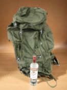 A Nepal 85 rucksack and bottle of Smirnoff Vodka 750ml