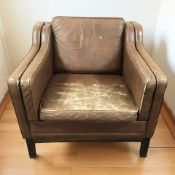 A 20th century Danish brown leather armchair in the style of Borge Mogensen,