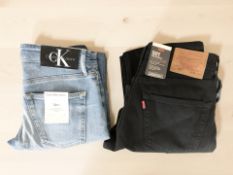 A new pair of Levi Strauss 501 Original black denim jeans,
