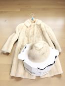 A vintage white mink fur coat by Michael's of Bristol,