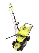 A Ryobi petrol lawn mower and electric pole hedge trimmer
