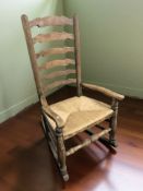 An elm farmhouse ladder backed rocking chair