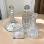 A ships decanter with etched grape vine decoration,