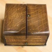 A Victorian oak sloped front correspondence box,