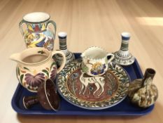 A collection of art pottery, jugs,