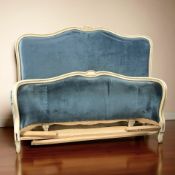 An early 20th century French painted double bed frame