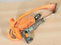 A Makita reciprocating saw and an electric strimmer