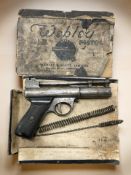 A Webley Mk 1 air pistol with remnants of original box