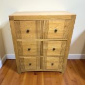 A modern oak six drawer chest,
