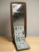 A 1970's teak framed mirror,