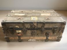 An early 20th century metal bound trunk,