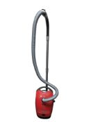 A Miele vacuum cleaner.