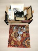 A Pentax ME Super camera, a Sankyo Super CM400 video camera,