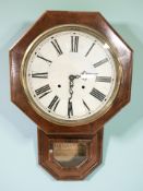 A 19th century American walnut drop dial wall clock labelled Waterbury Clock Company, Connecticut,