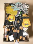 New garden hand forks and various pairs of gloves.