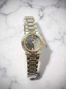 A lady's stainless steel and gold-plated Gucci quartz wristwatch,